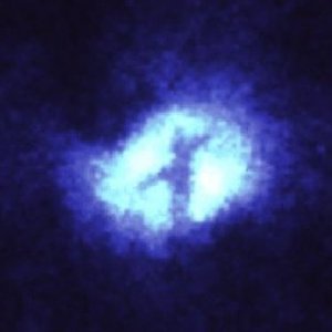Hubble picture of an unusual formation in space. Looks like a cross to me? How about you?
