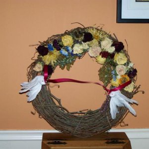 003wreath I made MIL out of FIL's flowers. dang upside down