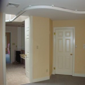 Ceiling track for lift entering the bathroom