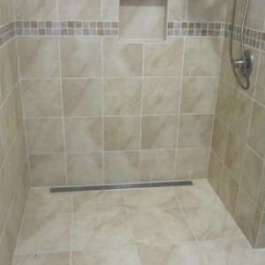 Accessible shower with gutter drain
