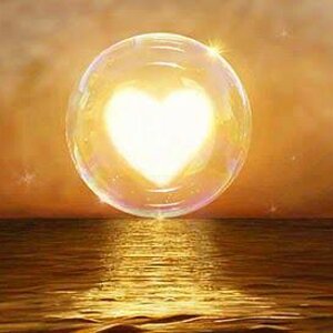 Photo golden heart in buble sea.jpg